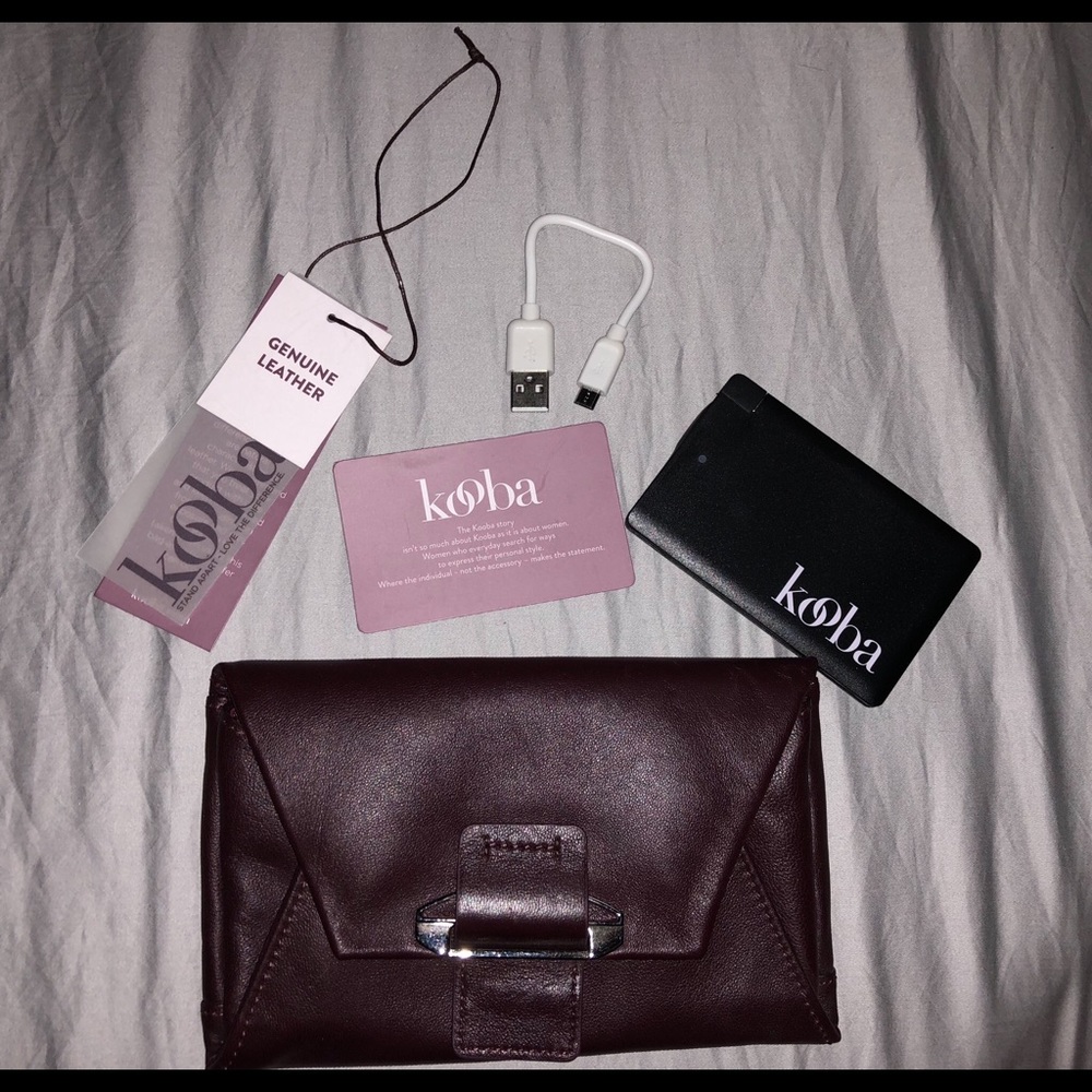 Kooba leather wallet with portable charger